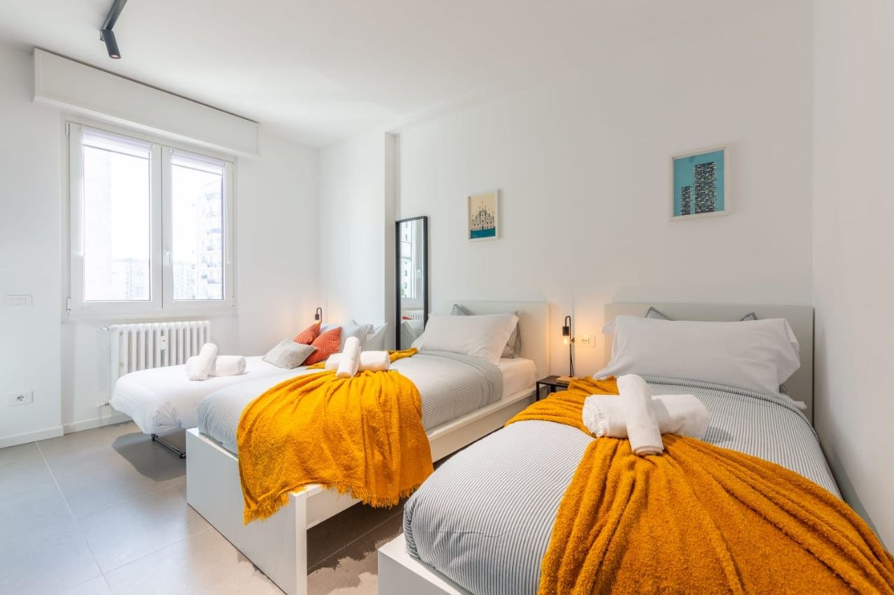 Second bedroom with three beds